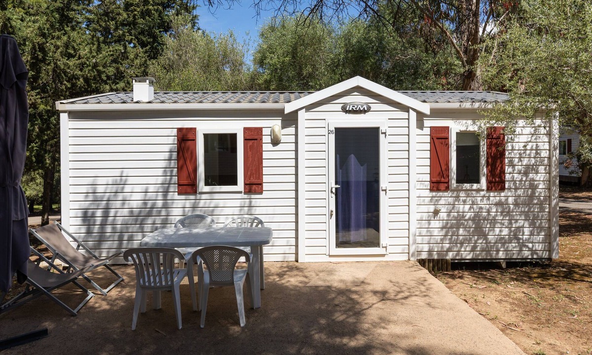 Palasca House | Mobile Home "Village Camping De L'ostriconi 26" with Sea View, Shared Pool and Wi-Fi