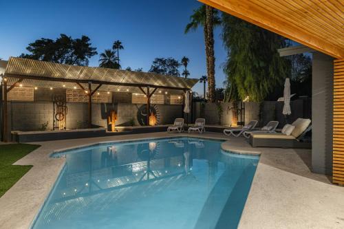 Trail West House | Modern Retreat with Pool Hot Tub Outdoor Kitchen