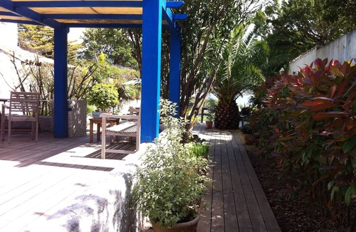 Pietrosella House | At the water's edge, a pretty blue house.