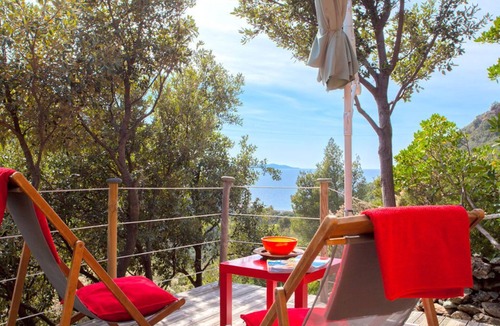 Olmeta di Capocorso Cabin | Cabin in the maquis, terrace and open kitchen with sea and mountain views