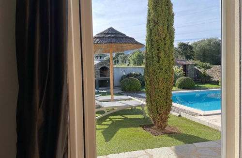 Oletta House | Contemporary villa with swimming pool and private garden