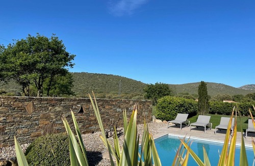 Oletta House | Contemporary villa with swimming pool and private garden