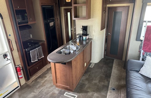 Gilbert House | Cozy RV tucked back in a quiet property with plenty of room to relax