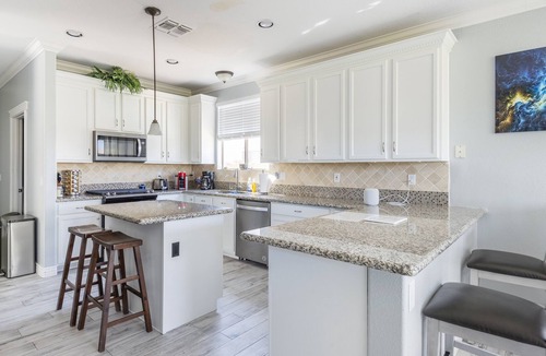 Augusta Ranch House | Cozy sun-kissed desert oasis by RedAwning