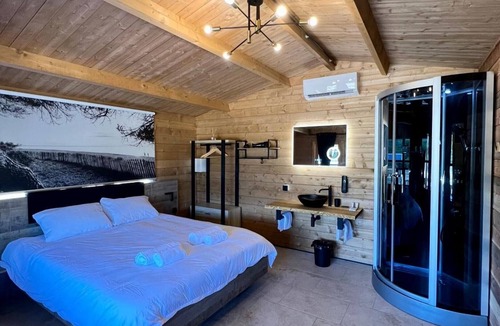 Occhiatana Bed & Breakfast | 'Les Chalets De Tesa' with Mountain View, Wi-Fi, and Air Conditioning