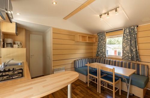 Palasca House | Mobile Home 'Village Camping De L'Ostriconi 28' with Sea View, Shared Pool and Wi-Fi