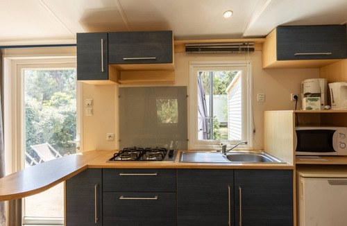 Palasca House | Mobile Home 'Village Camping De L'Ostriconi 28' with Sea View, Shared Pool and Wi-Fi
