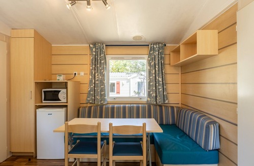Palasca House | Mobile Home "Village Camping De L'ostriconi 26" with Sea View, Shared Pool and Wi-Fi
