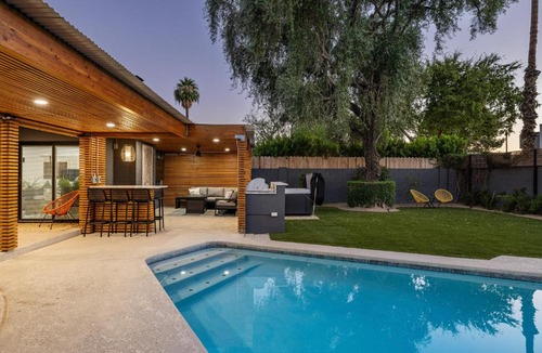 Trail West House | Modern Retreat with Pool Hot Tub Outdoor Kitchen