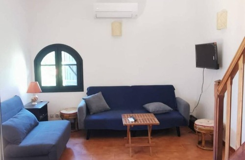 Molini Condo | Studio sur Terrasse et Jardin Clos Bord de mer