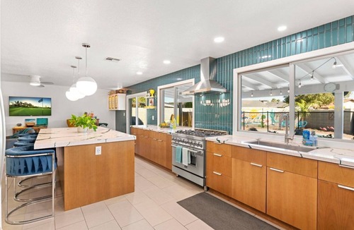 Village Grove House | Vibrant MidCentury Home in OldTown-Htd Pool, Firepit, Games, EV+, Garage