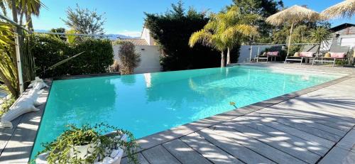 Porto-Vecchio Villa | Villa CASA BAGGIA, proche plage, piscine à débordement chauffée, pool house