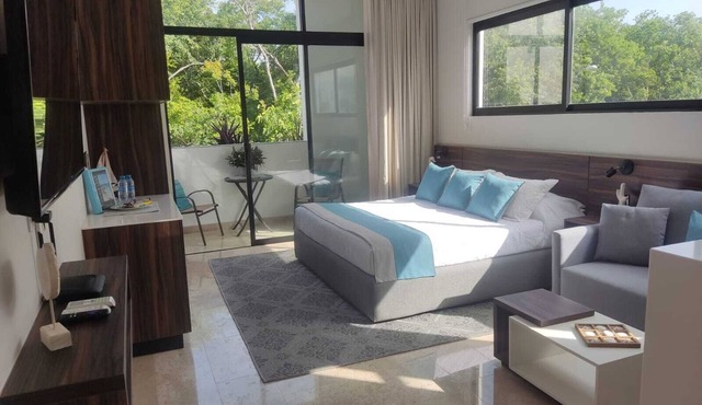 Cozy fully equipped studio with balcony in Tulum with amazing pool inthe rooftop