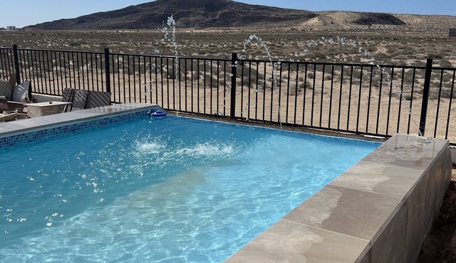 Gorgeous mountain views just 200 yards from the beach with private backyard pool