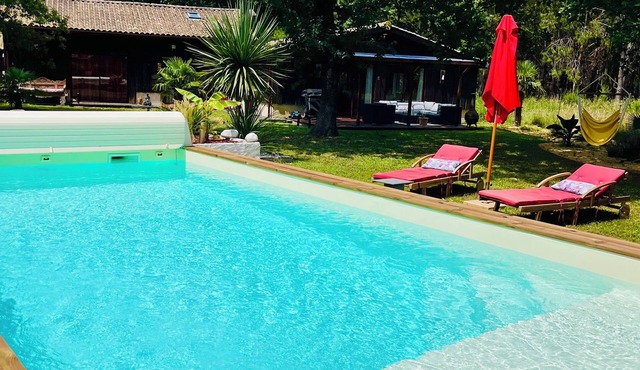 Maison en bois sur parc de 2000 m2 avec piscine chauffée au sel + wifi