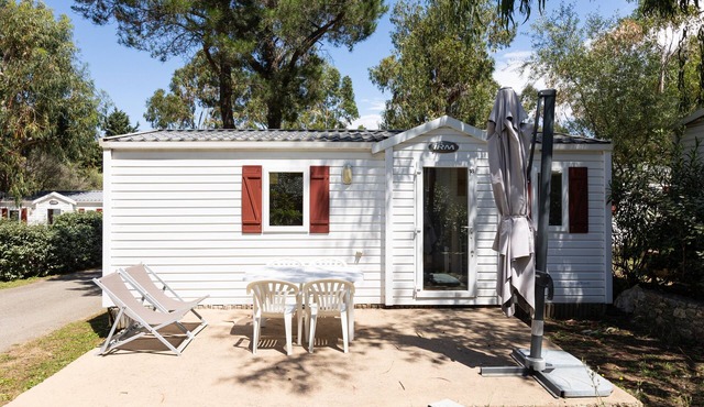 Mobile Home “Village Camping De L'ostriconi 18” with Mountain View, Shared Pool & Wi-Fi