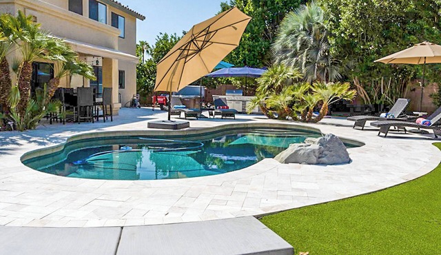 Resort Backyard with Pool, Spa & Putting Green