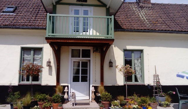 Rustic farmhouse in the center of the village.