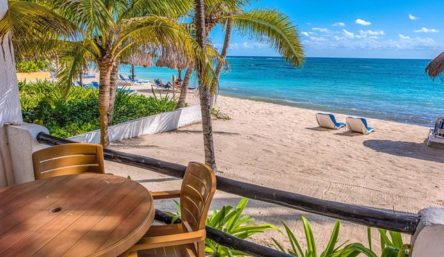 Walk onto the beach from your patio door! AC, WiFi, great for families!